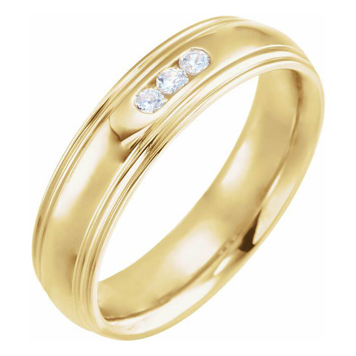 gold ring with 3 small diamonds