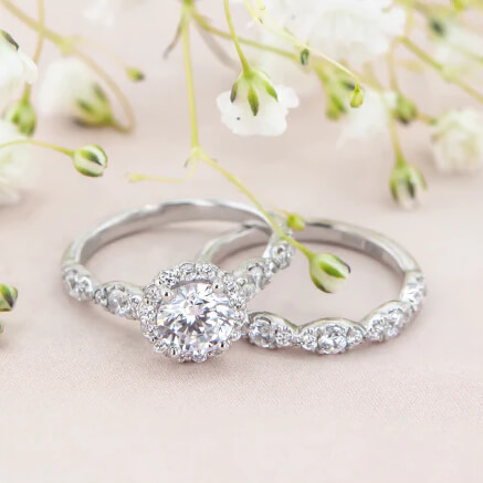 stacked engagement ring and wedding band with diamonds